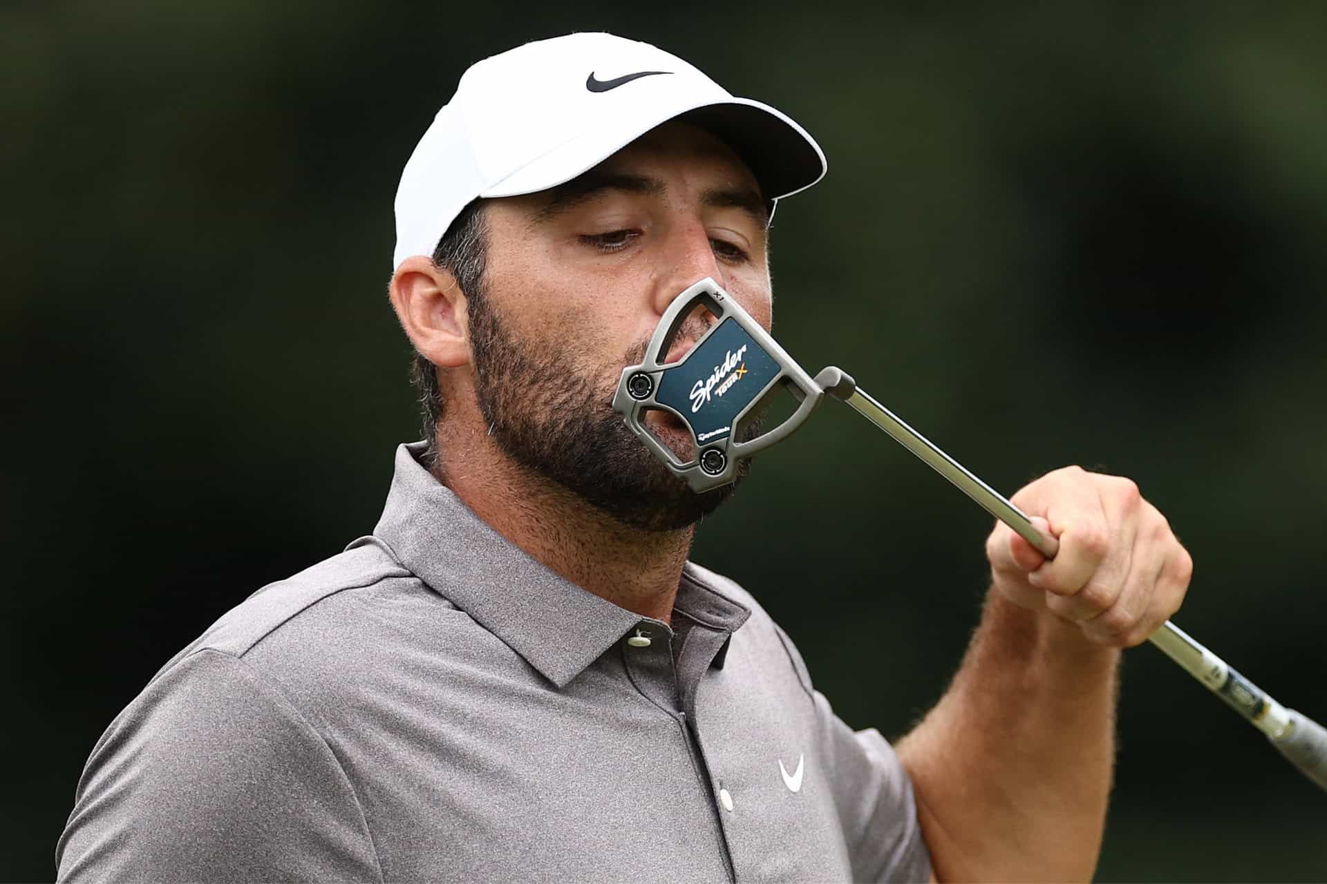 Scottie Scheffler showing his love for his mallet putter.